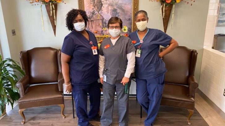 Registered Nurse Susan Steen (center) with Certified Nursing Assistants Brenda Jackson and Sheila Pierce.